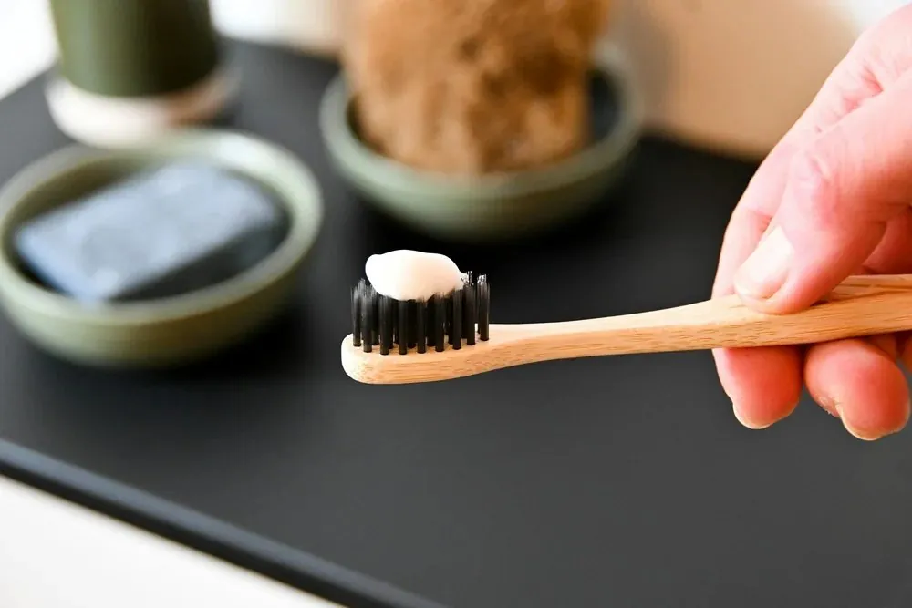 A toothbrush with toothpaste — daily brushing for healthy gums